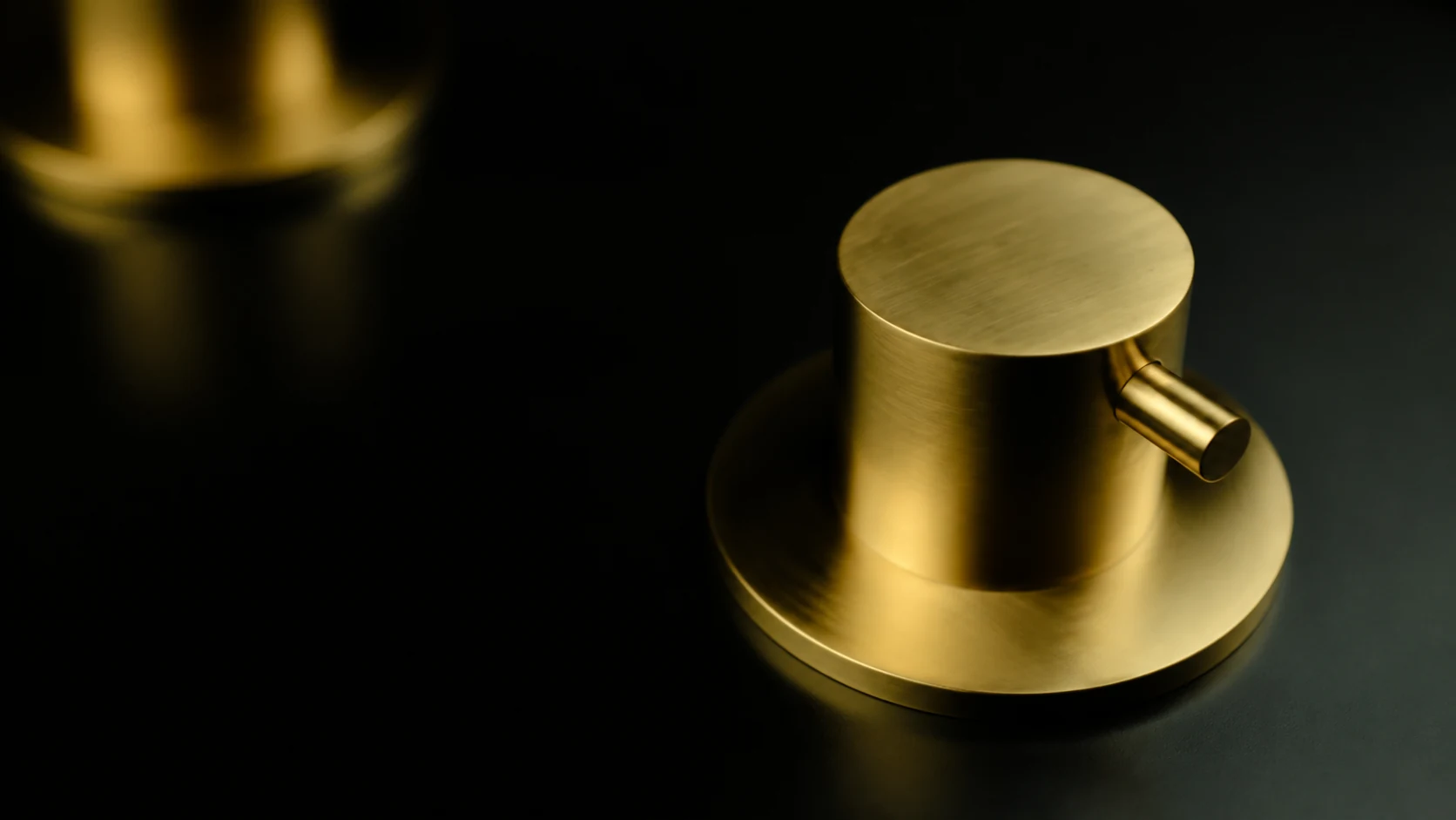 Brushed gold Aqualem fixture detail.